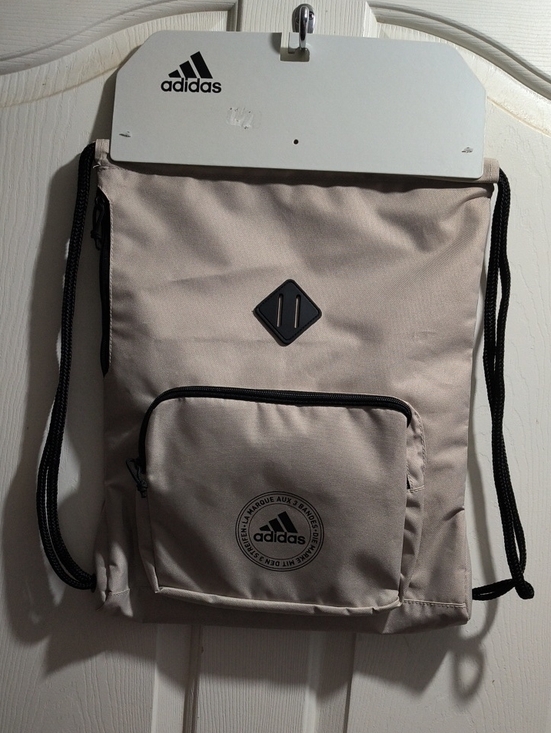 adidas Other - adidas Beige Drawstring Backpack with Front Pocket and Black Accents